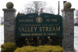 Community sign for Valley Stream community that reads 'welcome to the valley stream'